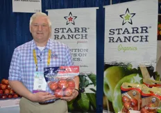 Dan Wohlford with Starr Ranch shows new branding on a pouch bag of Pink Lady apples. Starr Ranch did a company re-brand at the end of last year.